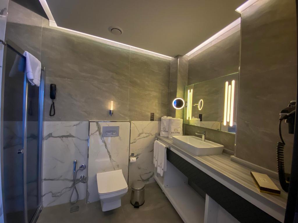 Ванная комната в Aileena Hotel & Villas