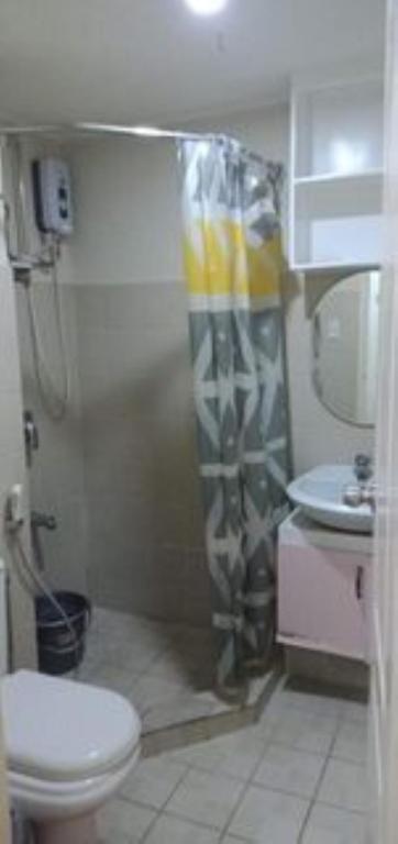 Koupelna v ubytování ONE OASIS a1 SM MALL DAVAO FREE POOL WIFI