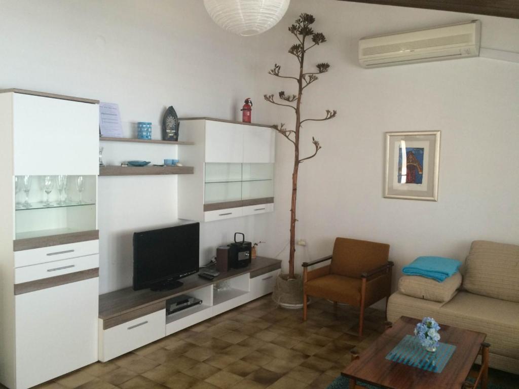 Posedenie v ubytovaní Apartment in Podgora with sea view, terrace, air conditioning, WiFi 134-3