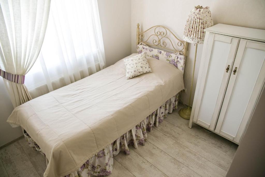 Postel nebo postele na pokoji v ubytování Lambert
