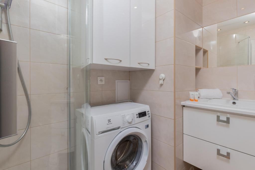 Kúpeľňa v ubytovaní City Center Apartment Gdynia by Noclegi Renters