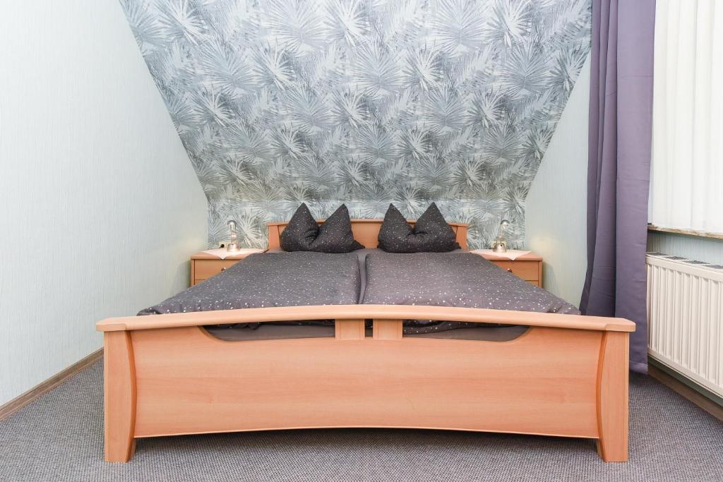 Postel nebo postele na pokoji v ubytování Ferienhaus Elfriede Coordes