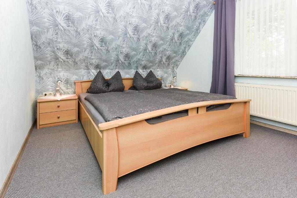 Postel nebo postele na pokoji v ubytování Ferienhaus Elfriede Coordes