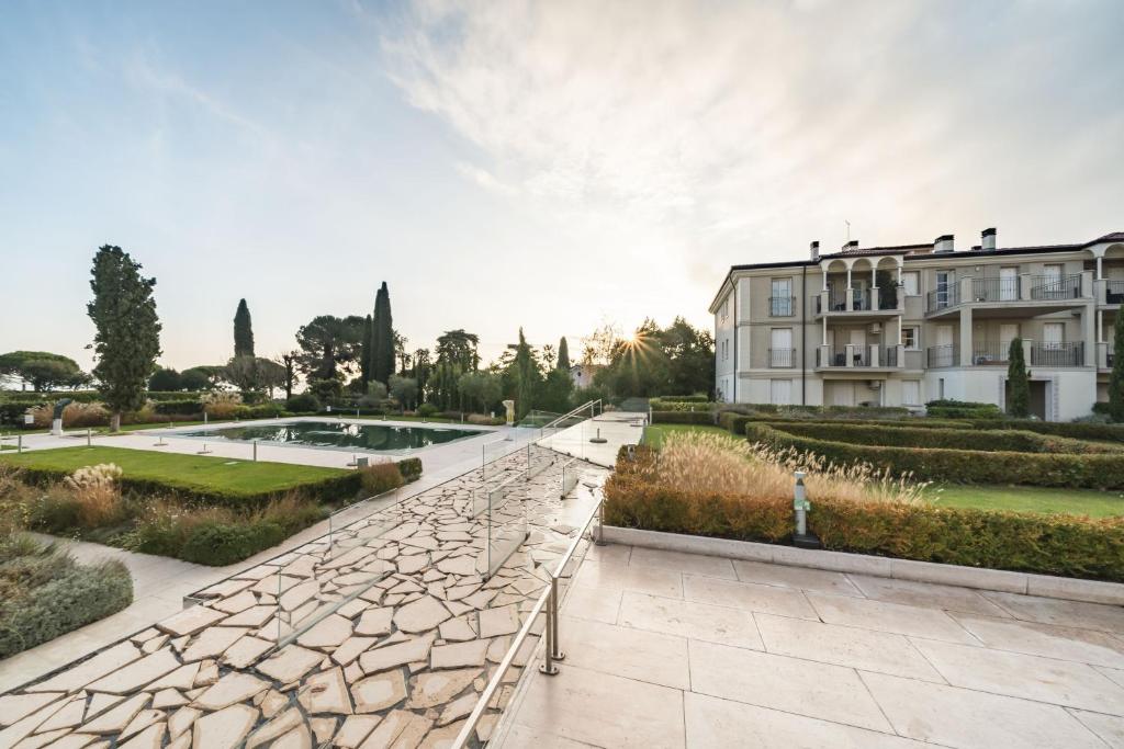 Vonkajšia záhrada v ubytovaní PooL - Relais Fasanella - by Host4U