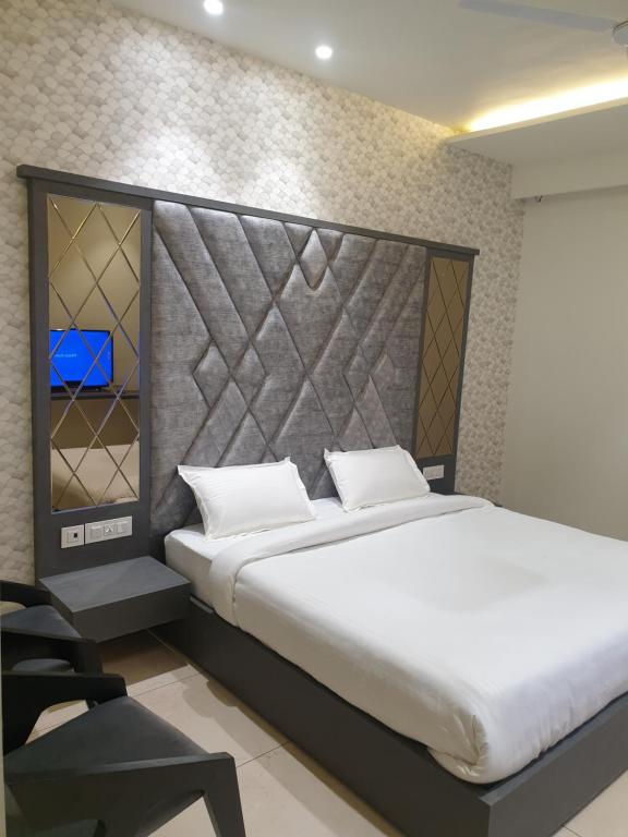 מיטה או מיטות בחדר ב-Hotel Mark