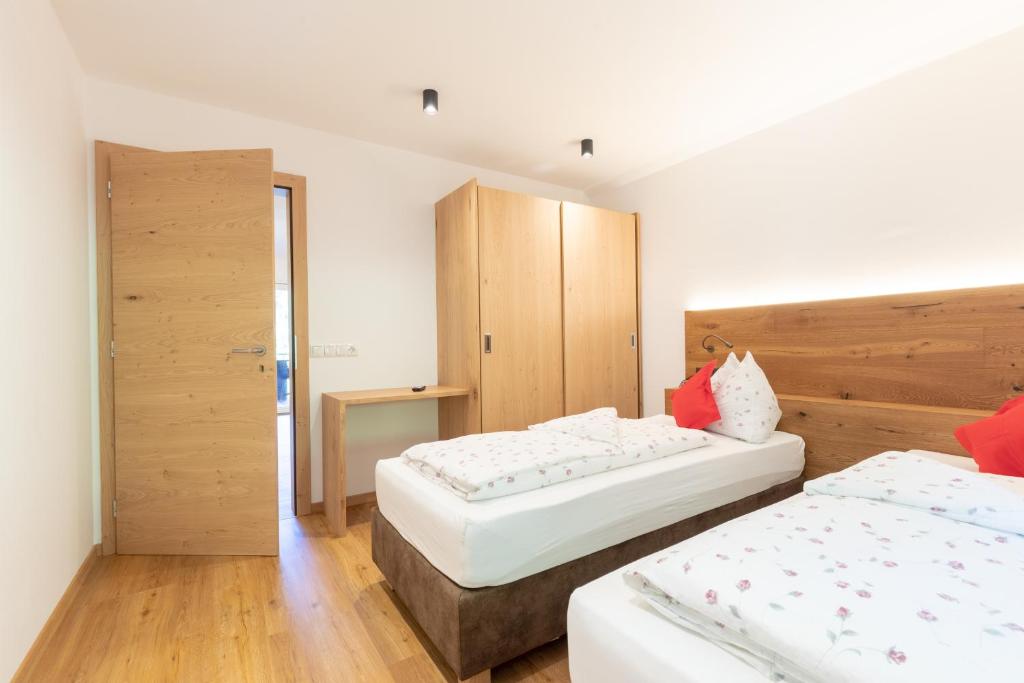 Postel nebo postele na pokoji v ubytování Haus Christian