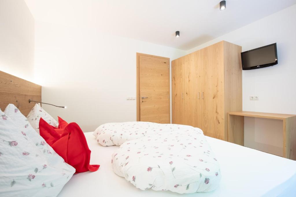 Postel nebo postele na pokoji v ubytování Haus Christian