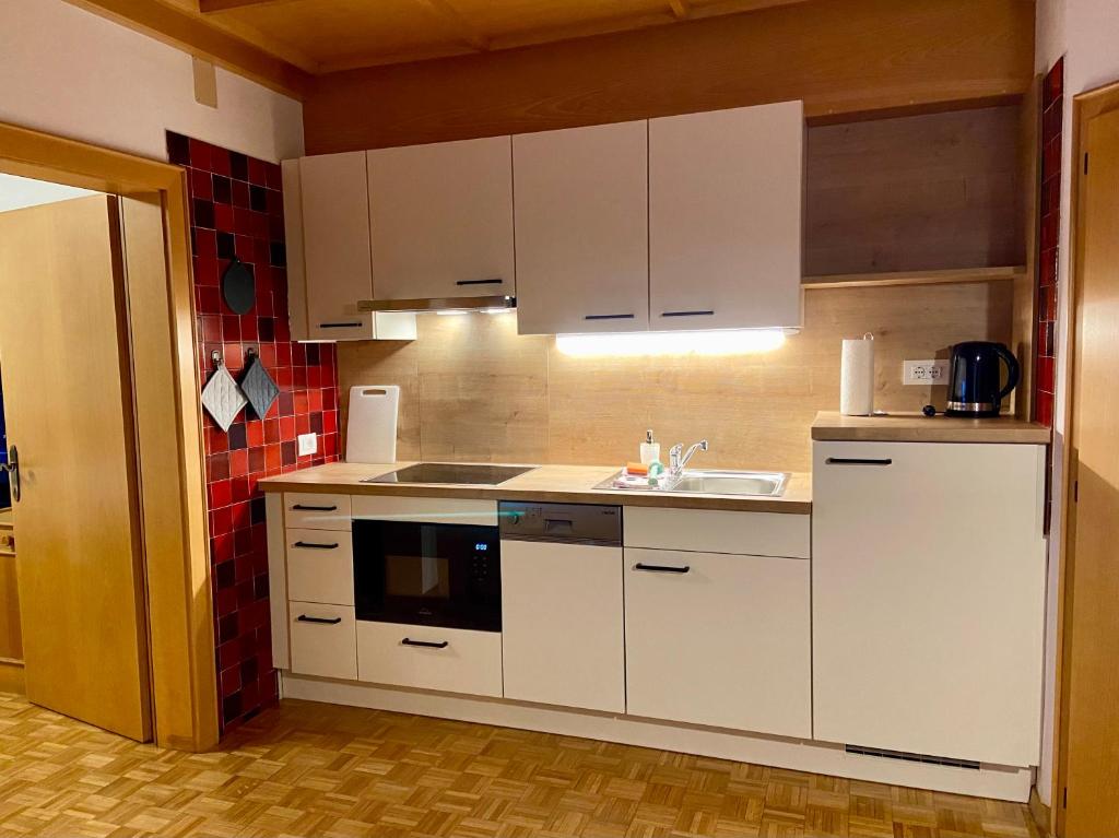 A kitchen or kitchenette at Villa Erika