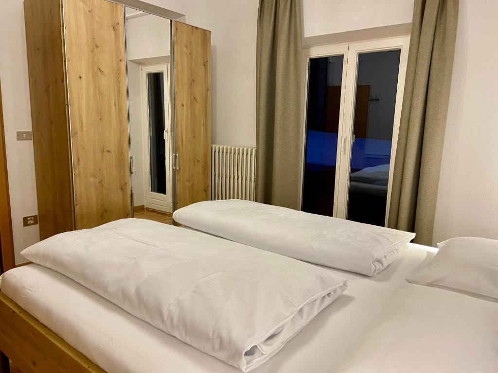 A bed or beds in a room at Villa Erika