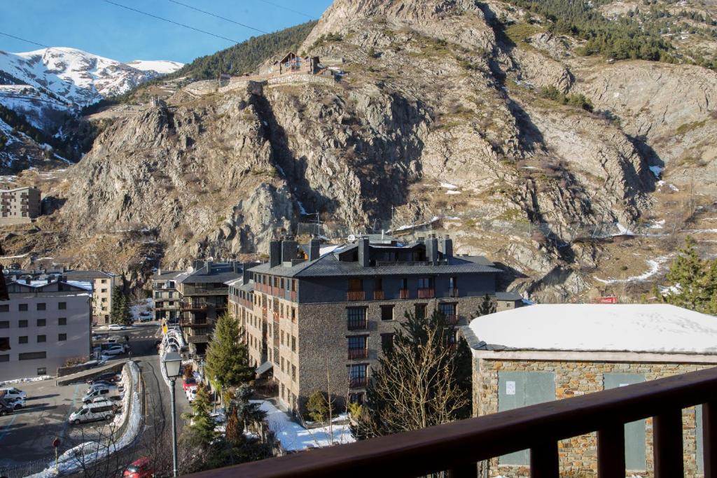 a view of a mountain from a balcony at Francoli in Canillo