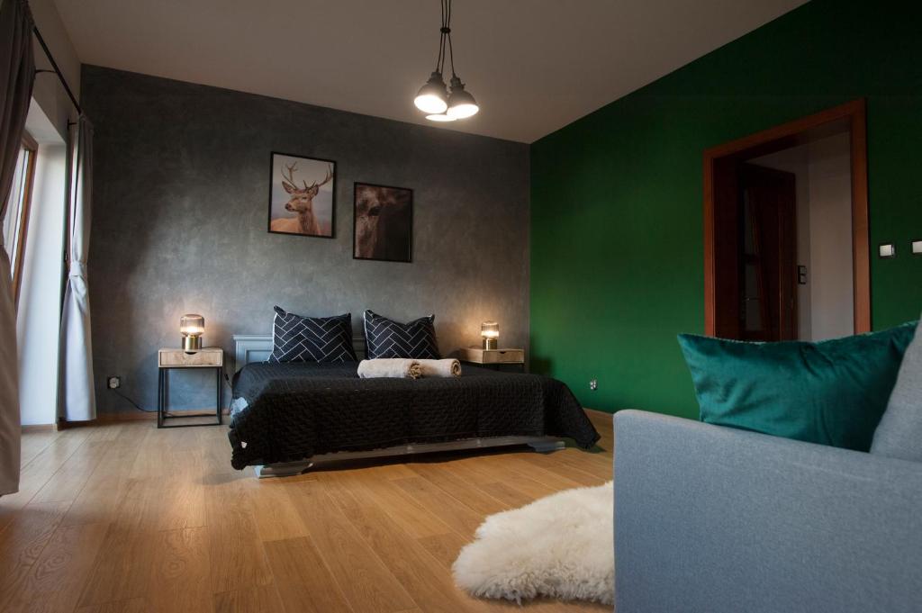 Posteľ alebo postele v izbe v ubytovaní KANIA Apartamenty - Zakopane