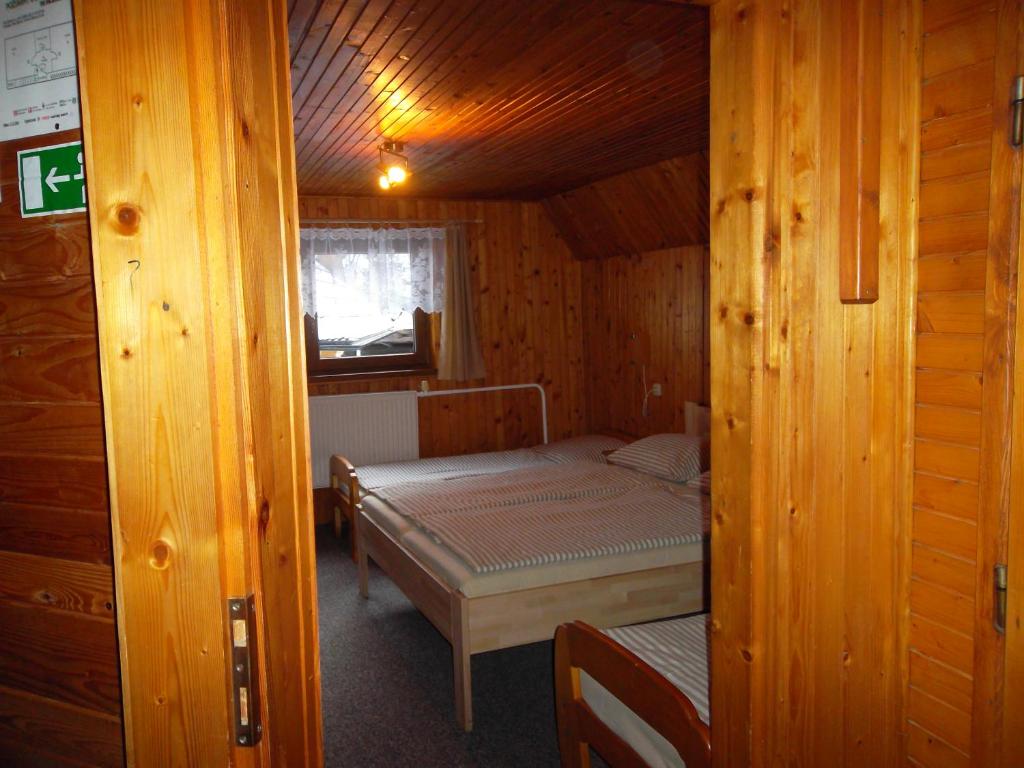 Postel nebo postele na pokoji v ubytování Chata Sipkova I