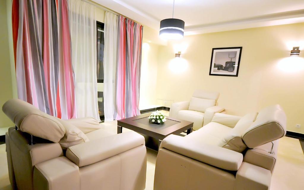 Area soggiorno di Le Rio Appart-Hotel City Center