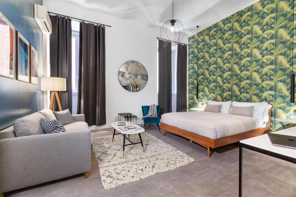 Postel nebo postele na pokoji v ubytování Residenza Flavia