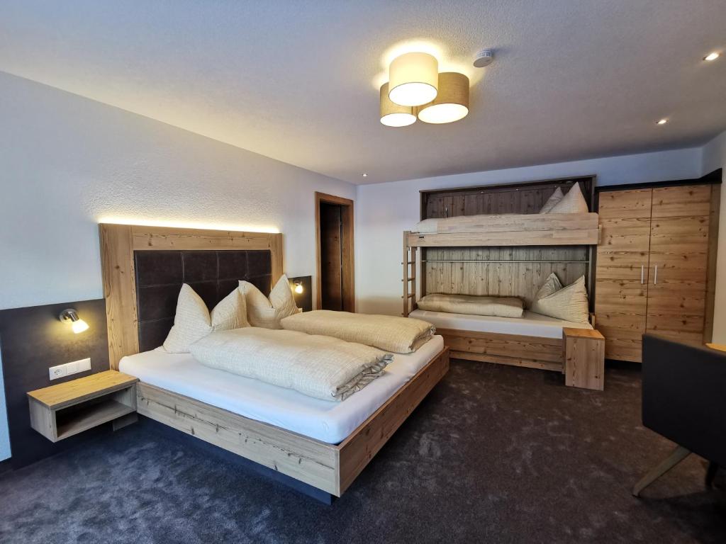 Posteľ alebo postele v izbe v ubytovaní Apart Grafspitz