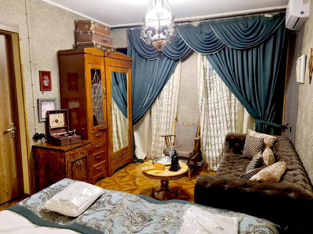 Postel nebo postele na pokoji v ubytování Piano Borracho Boutique Hotel Old Tbilisi