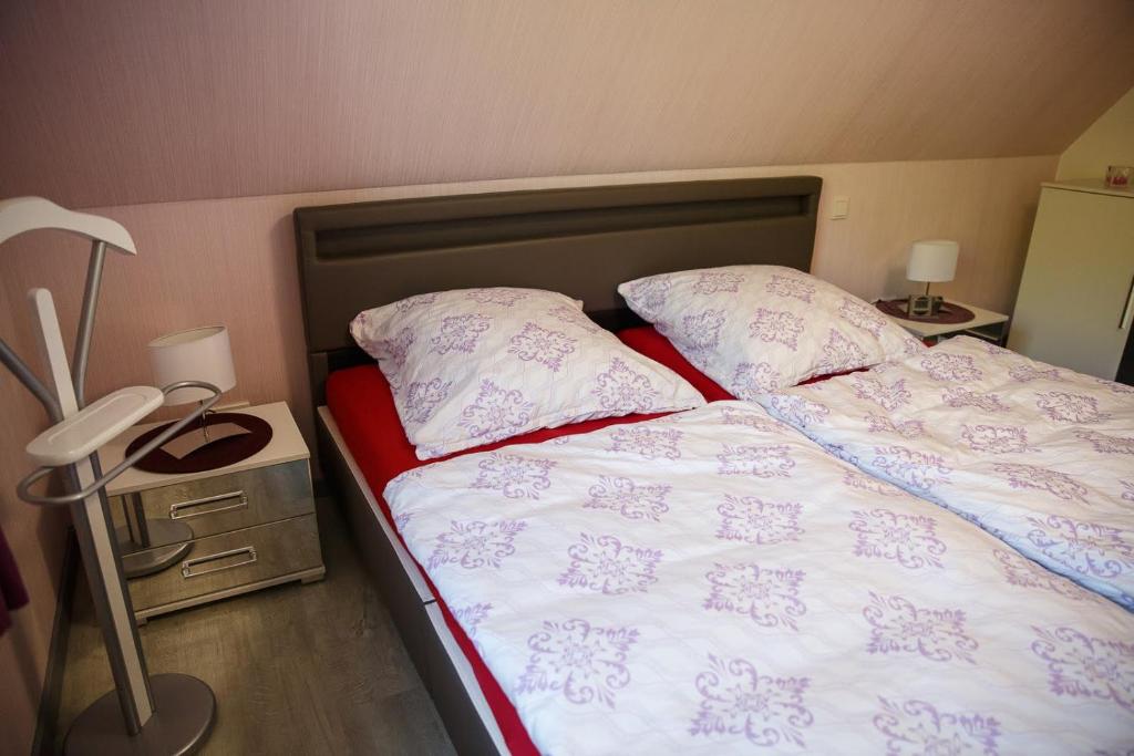 Postel nebo postele na pokoji v ubytování Ferienwohnung Ogger