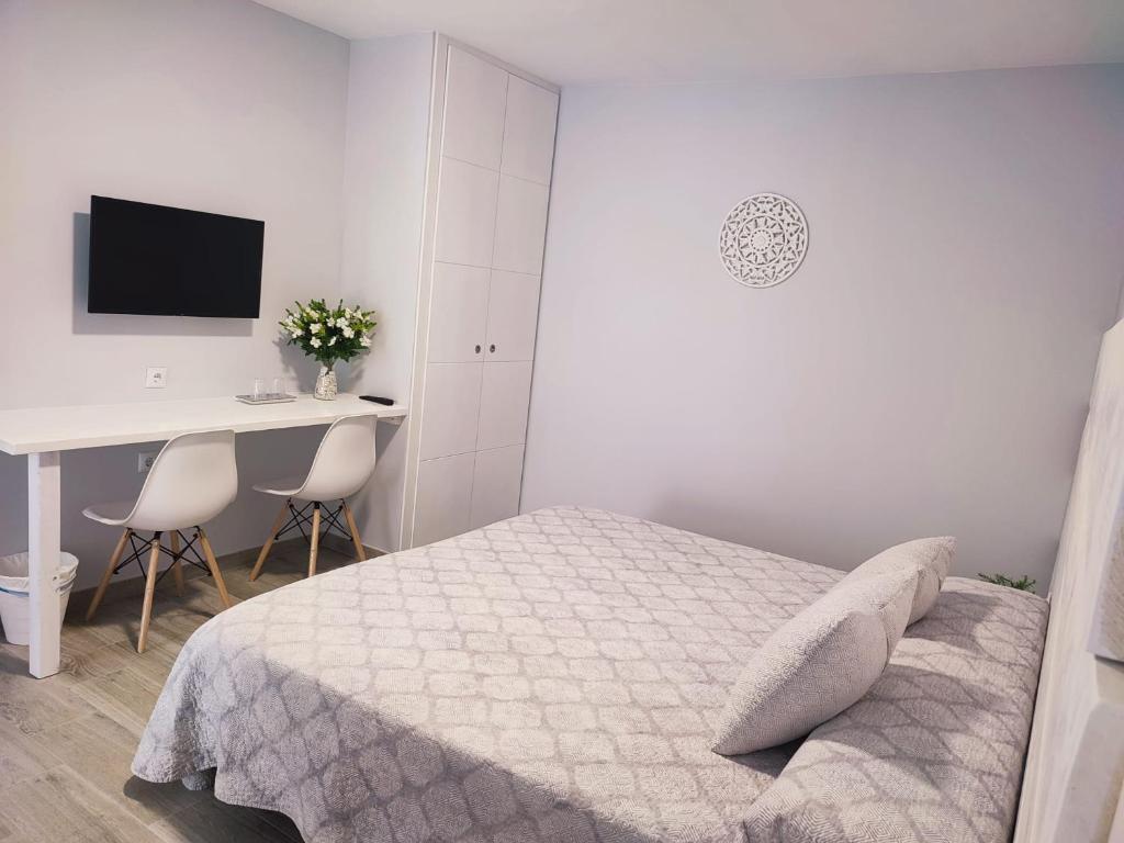 Cama o camas de una habitación en Posada de la plata