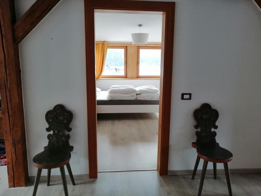 Postel nebo postele na pokoji v ubytování Bella Vista Lodge