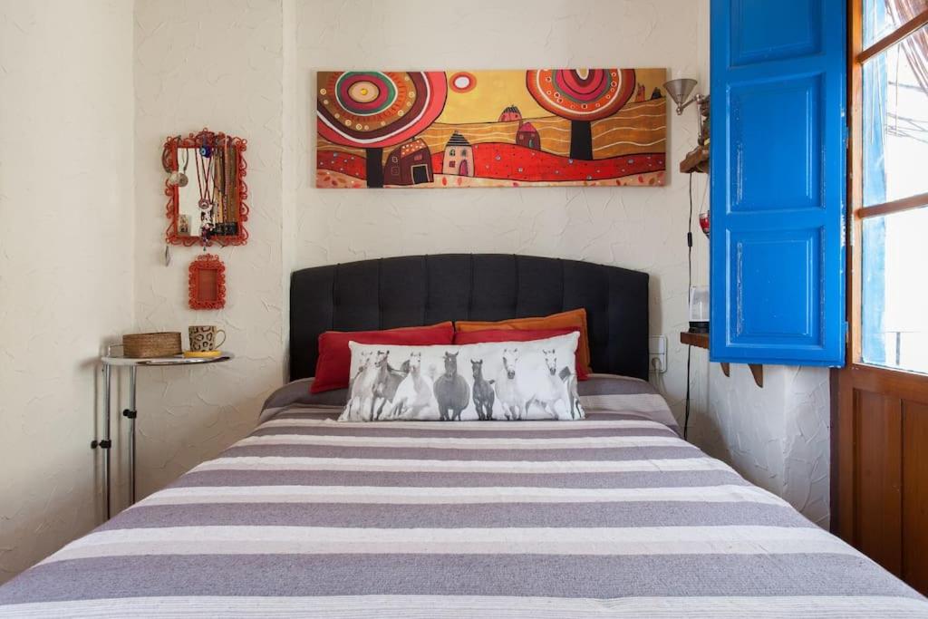 Postel nebo postele na pokoji v ubytování La casita azul