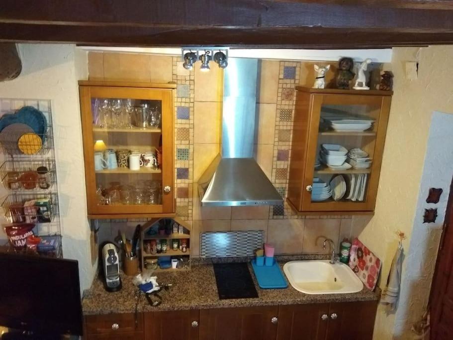 Kuchyň nebo kuchyňský kout v ubytování La casita azul