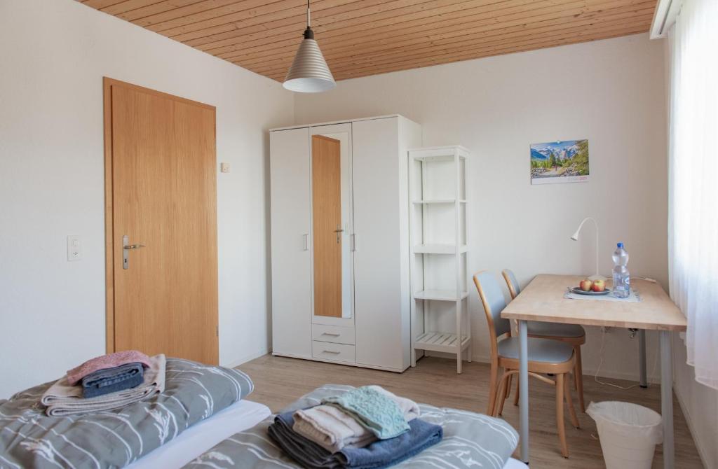 Postel nebo postele na pokoji v ubytování BnB Bergsicht