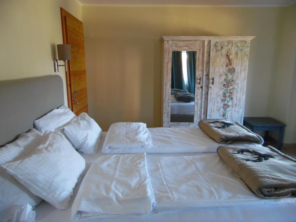 Postel nebo postele na pokoji v ubytování Bella Vista Lodge