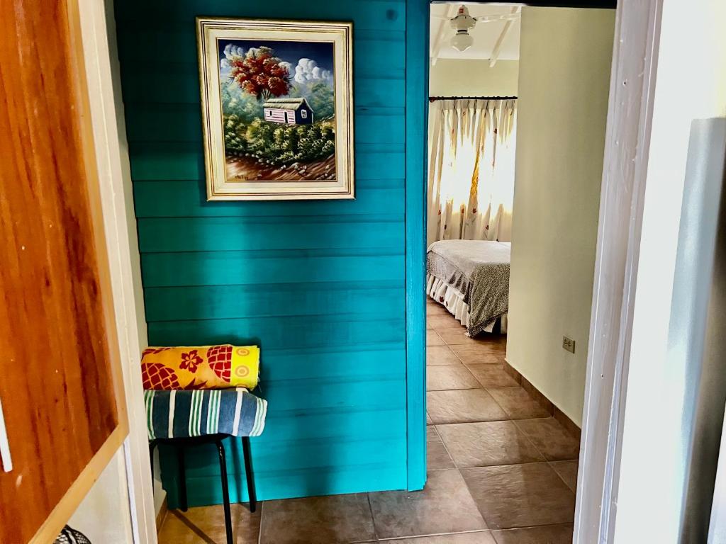 Postel nebo postele na pokoji v ubytování El Yaguacil Aparta Hotel