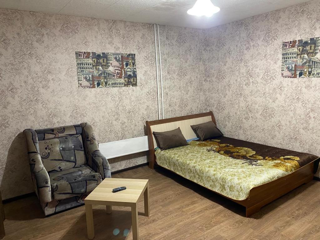 Gulta vai gultas numurā naktsmītnē Apartment on Pavlovskogo street 21