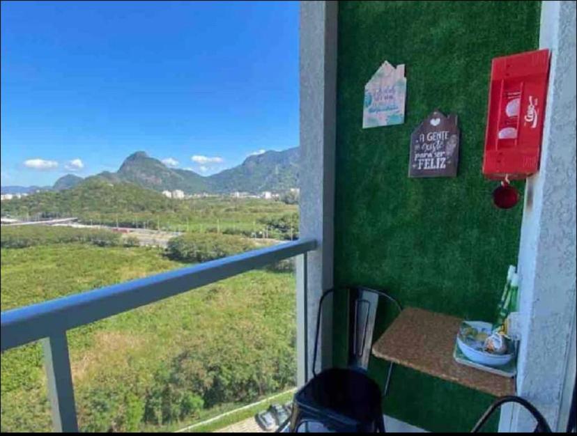 a room with a window with a view of a mountain at Aconchego e melhor visual é aqui! in Rio de Janeiro