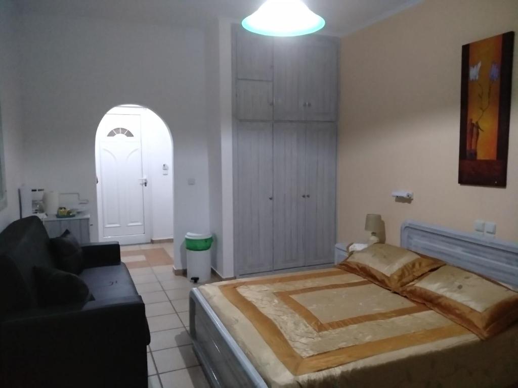 Posteľ alebo postele v izbe v ubytovaní Vokamvilia Apartment & Studio Close to the sea