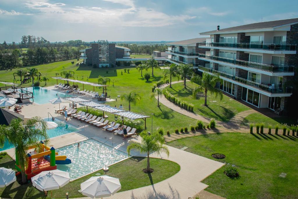 an aerial view of a resort with a swimming pool at Altos del Arapey All Inclusive, Golf & Spa in Termas del Arapey