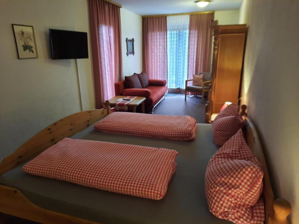Postel nebo postele na pokoji v ubytování Landgasthof Rotlipp Gästezimmer