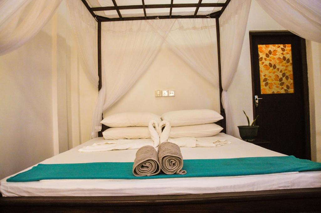 Voodi või voodid majutusasutuse Gem Light Guest House toas