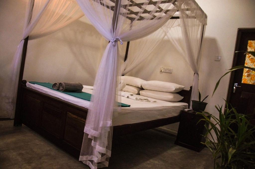 Voodi või voodid majutusasutuse Gem Light Guest House toas