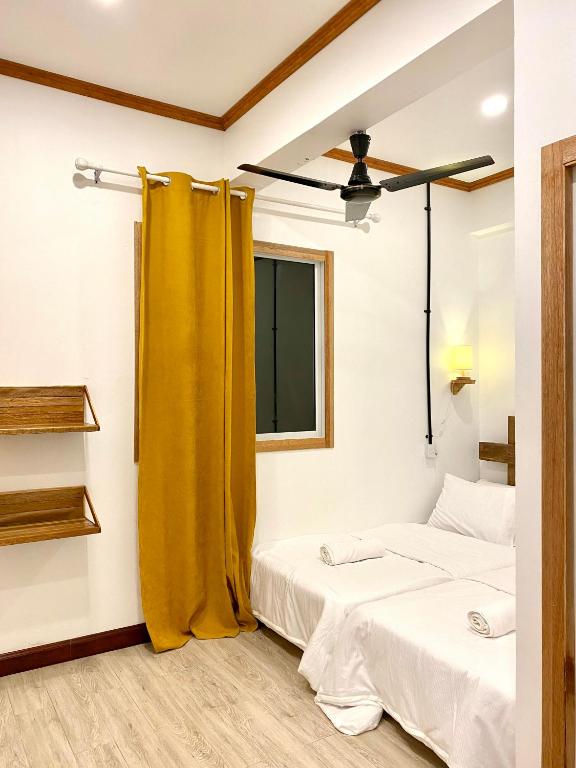 Postel nebo postele na pokoji v ubytování Hiraeth island home