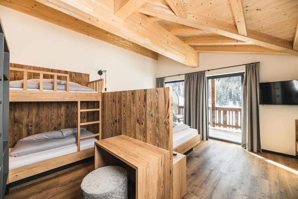 Postel nebo postele na pokoji v ubytování Hotel Wolf