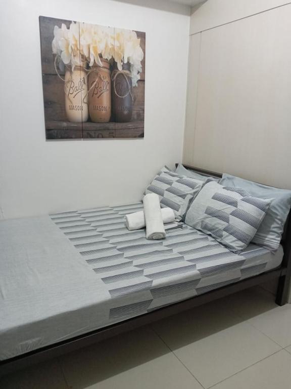 Postel nebo postele na pokoji v ubytování LIAM's Staycation