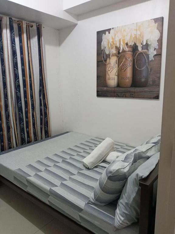 Postel nebo postele na pokoji v ubytování LIAM's Staycation