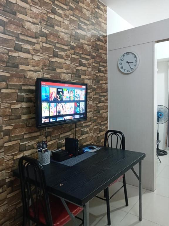 TV a/nebo společenská místnost v ubytování LIAM's Staycation