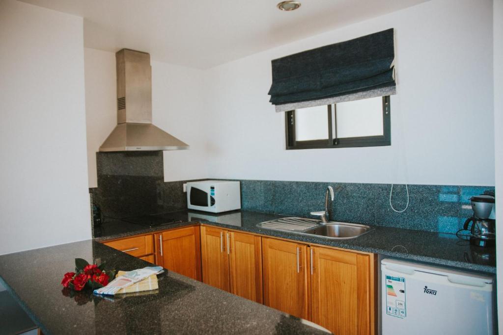 Kuchyň nebo kuchyňský kout v ubytování Casa da Capelinha