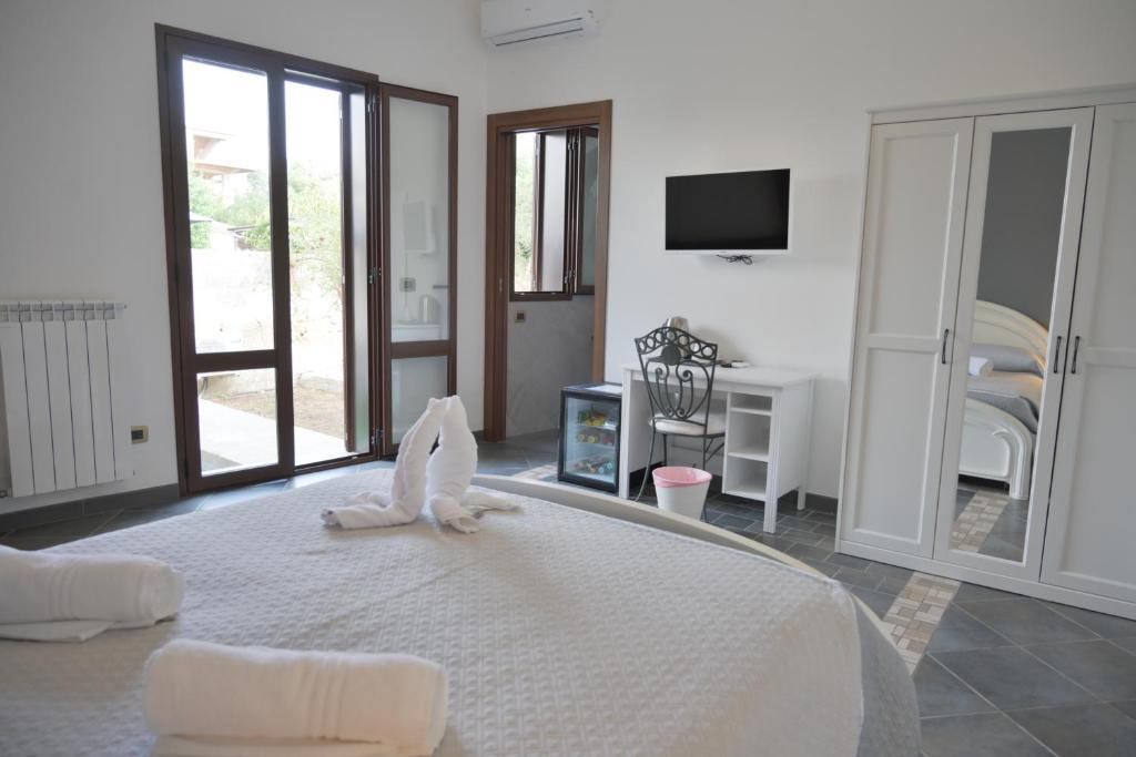Posteľ alebo postele v izbe v ubytovaní B&B Sale e Sole sul Mare