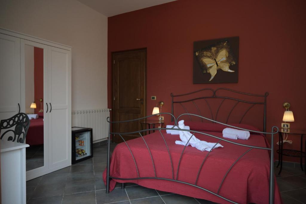 Posteľ alebo postele v izbe v ubytovaní B&B Sale e Sole sul Mare
