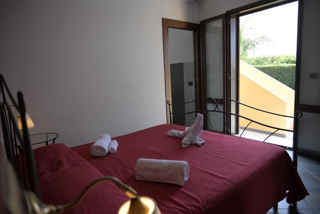 Posteľ alebo postele v izbe v ubytovaní B&B Sale e Sole sul Mare