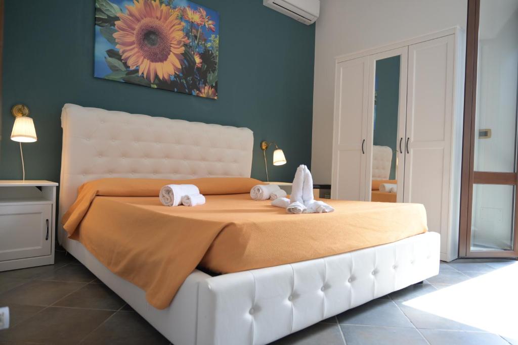 Posteľ alebo postele v izbe v ubytovaní B&B Sale e Sole sul Mare