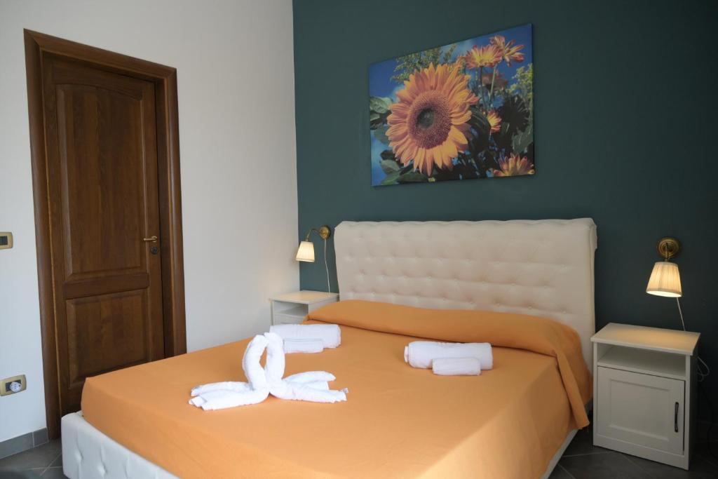 Posteľ alebo postele v izbe v ubytovaní B&B Sale e Sole sul Mare