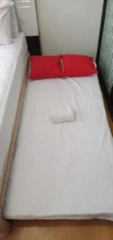 Postel nebo postele na pokoji v ubytování ONE OASIS a1 SM MALL DAVAO FREE POOL WIFI