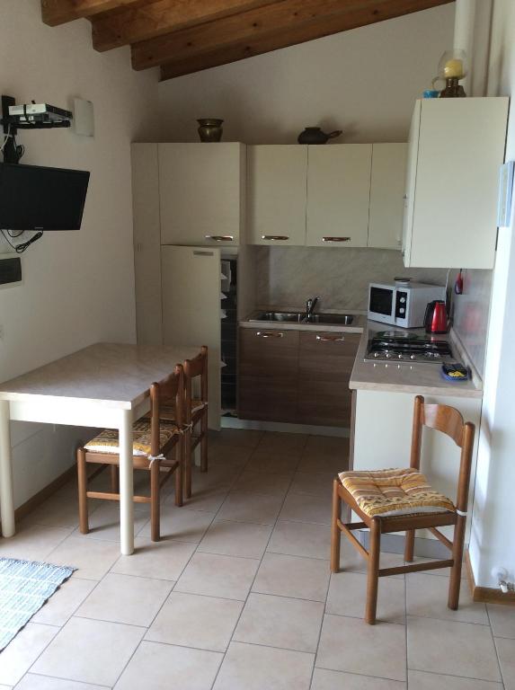 Kuchyňa alebo kuchynka v ubytovaní B&B Camister