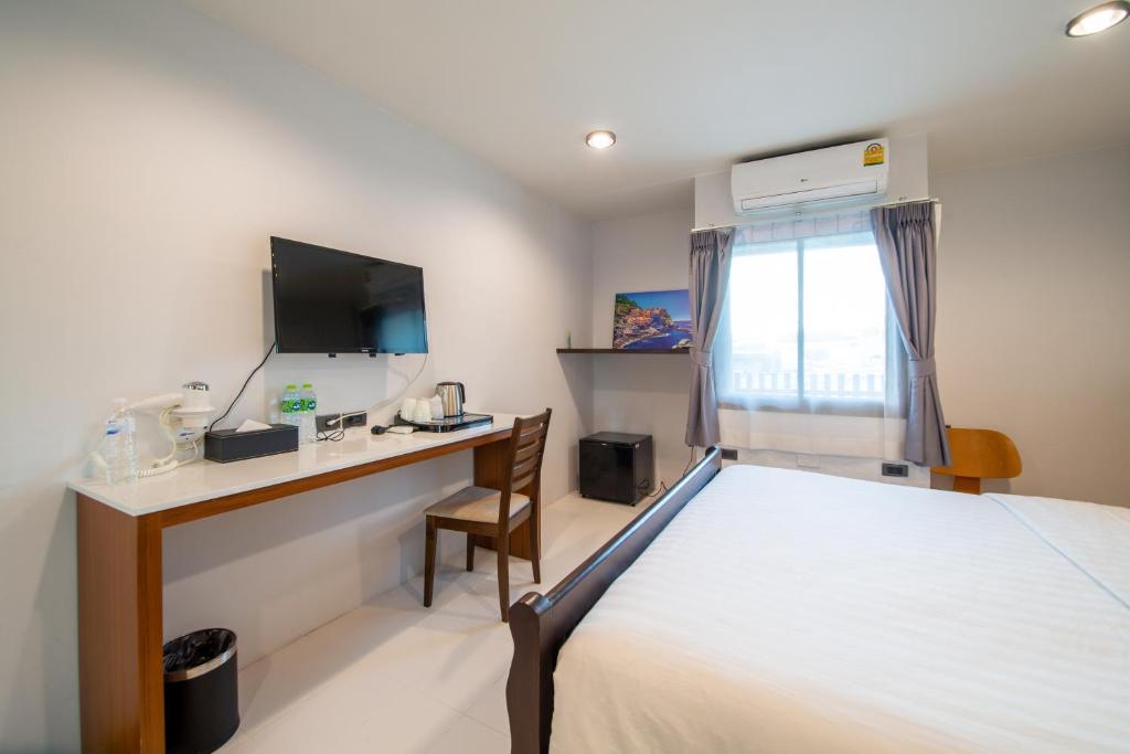 TV a/nebo společenská místnost v ubytování WE Terminal Hotel