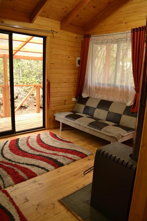 Un lugar para sentarse en Cabañas Los Cuatro Robles